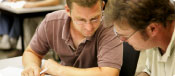 Two men working together